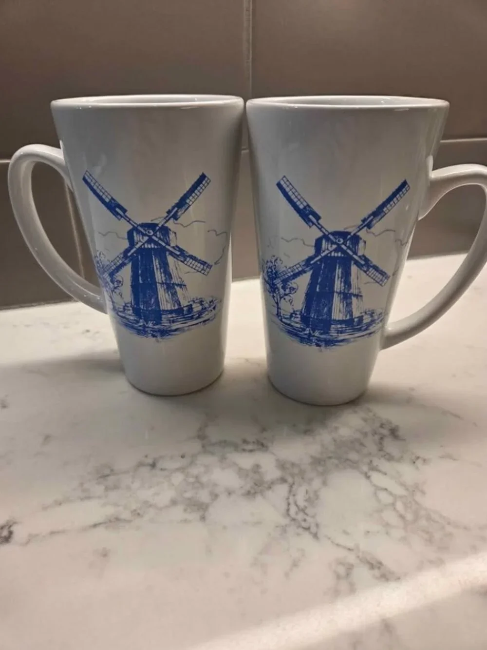 Vintage Pair of 16 oz white ceramic coffee/latte mugs featuring a blue Dutch win